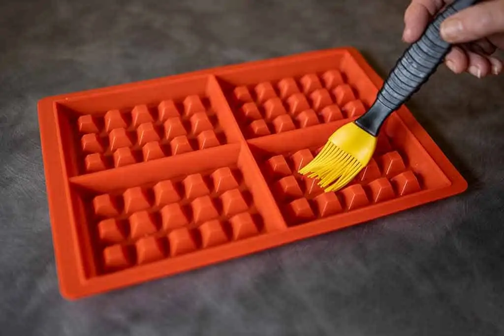 Greasing-a-silicone-waffle-mold-How To Grease A Waffle Iron Without Spray