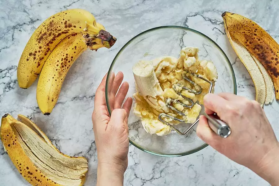 Mashing-bananas-to-replace-oil-in-waffles