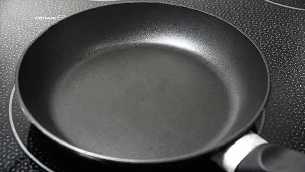 The teflon coating on a nonstick frying pan