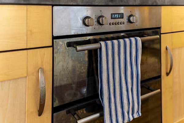 Dish-towel-over-oven-door