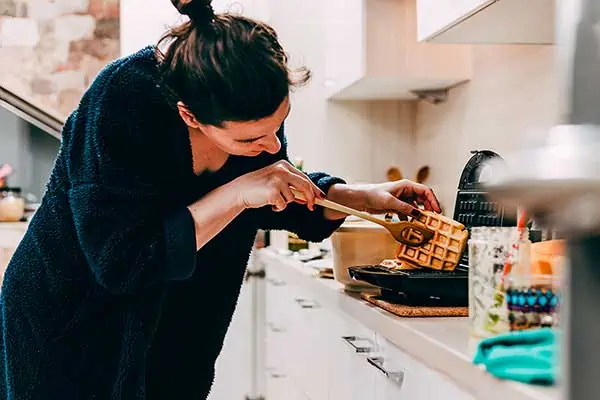 woman-removing-waffle
